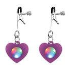 Purple heart nipple clamps with iridescent centers from Charmed Silicone Light Up collection