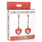 Packaged set of Charmed Silicone Light Up Heart Tweezer Nipple Clamps