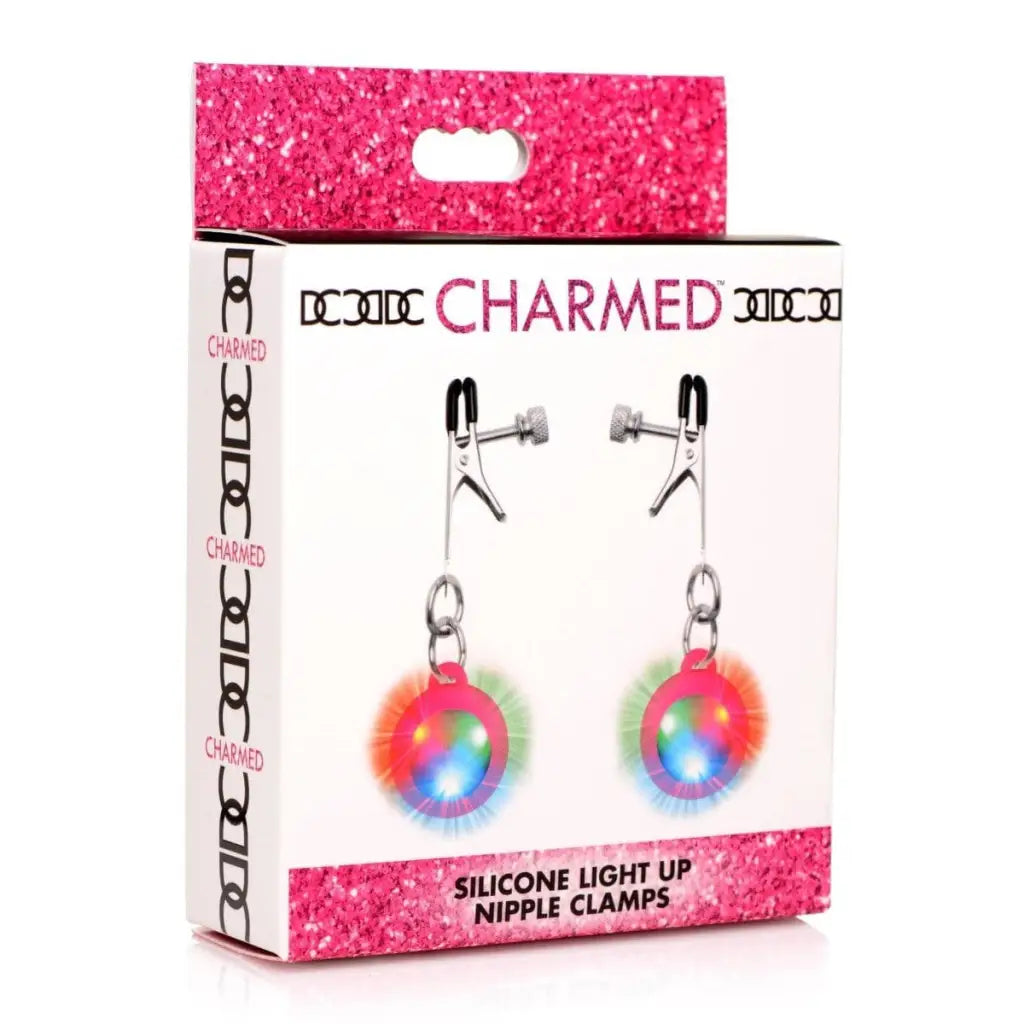 Charmed Nipple Clamp Pink Charmed Silicone Light Up Nipple Clamps at the Haus of Shag