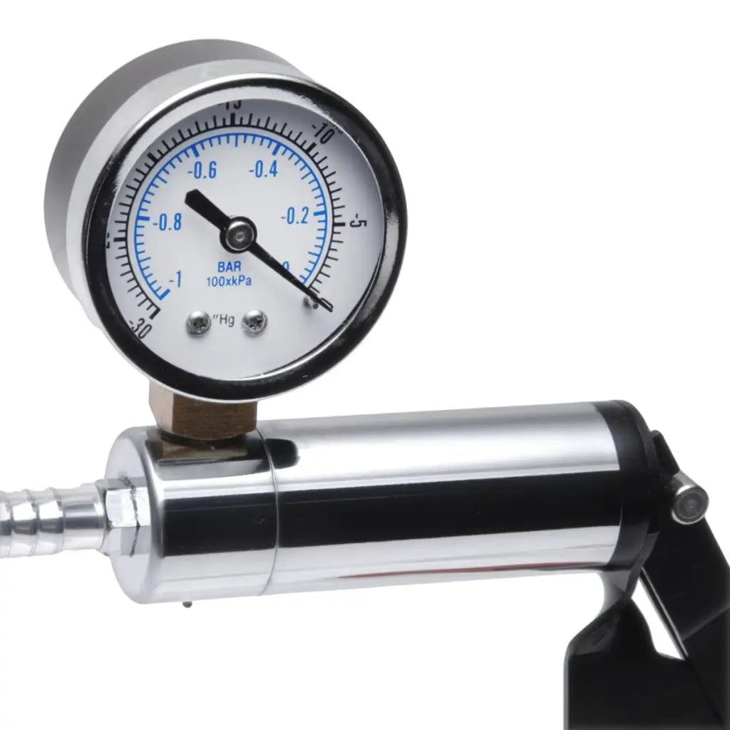 Pressure gauge on cylindrical device with hose in Cock And Ball Deluxe Penis Pumping Kit