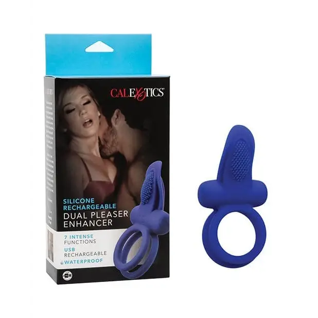 Close-up of the blue Couples Enhancers Silicone Rechargeable Dual Pleaser with woman in background