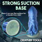 Blue octopus-shaped sex toy with deep breath, suction cup base for hands-free fun