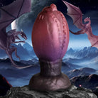 Phallic pink sex toy resembling a baby dragon egg from Creature Cocks Dragon Hatch collection