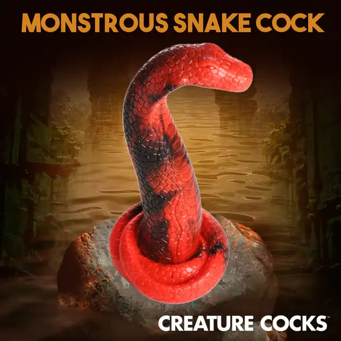 A red snake labeled ’monstroussnak’ on the Creature Cocks King Cobra Silicone Dildo package