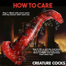 Poster with a giant red Creature Cocks King Cobra Silicone Dildo in the middle