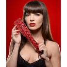 Crimson Tied Steel Enforced Spanking Paddle with geometric red leather design