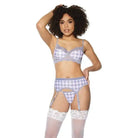 Woman in crystal pink buffalo check lingerie set with white stockings by Coquette