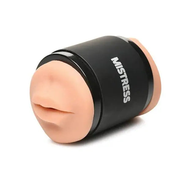 Curve Novelties Mistress Mini Double Stroker with black and white ear plug featuring the logo