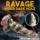 Creature Cocks Cyclops Monster Silicone Dildo with suction cup against a stormy backdrop