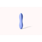 Dame Dip Silicone Vibrator in light blue with a curved design for personal massage