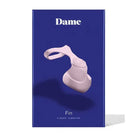 Dame Fin Finger Vibrator: Pale pink, ergonomic design against deep blue background