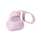 Pale pink Dame Fin Finger Vibrator container with curved handle and spout