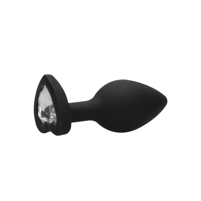 A Diamond Heart Butt Plug with a glowing black plastic knob and white light