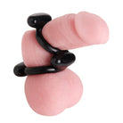 Dual Stretch black and pink flesh plugs for the Fit Cock And Ball Ring