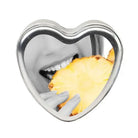 Heart-shaped frame with teeth biting pineapple, showcasing Earthly Body Sun Touched Edible Candle