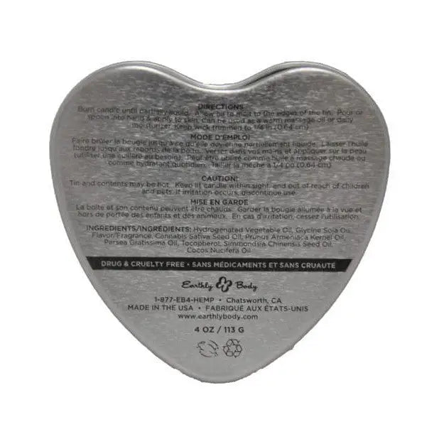 Heart-shaped metal tin of Earthly Body Sun Touched Tropical Edible Candle with printed info