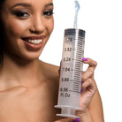 Enema syringe with tapered tip and silicone tube, oversized with volume markings up to 10.56 fl. oz