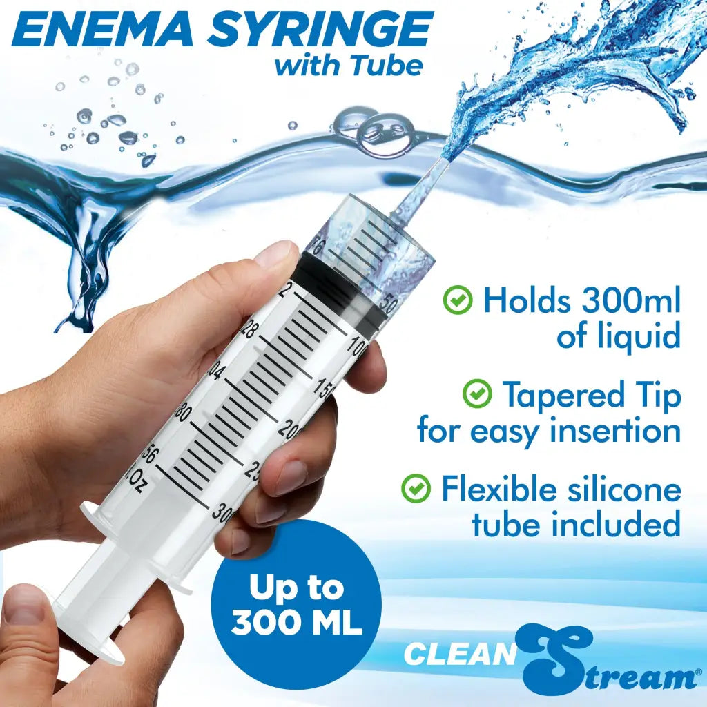 Enema syringe with silicone tube and tapered tip for liquid solution administration