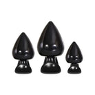 Evolved Anal Delights 3 Piece TPR Rubber Butt Plug Kit with black plastic candles