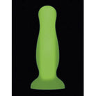 Evolved Luminous Plug: Green Plastic Dildo with Black Background for Vibrant Pleasure