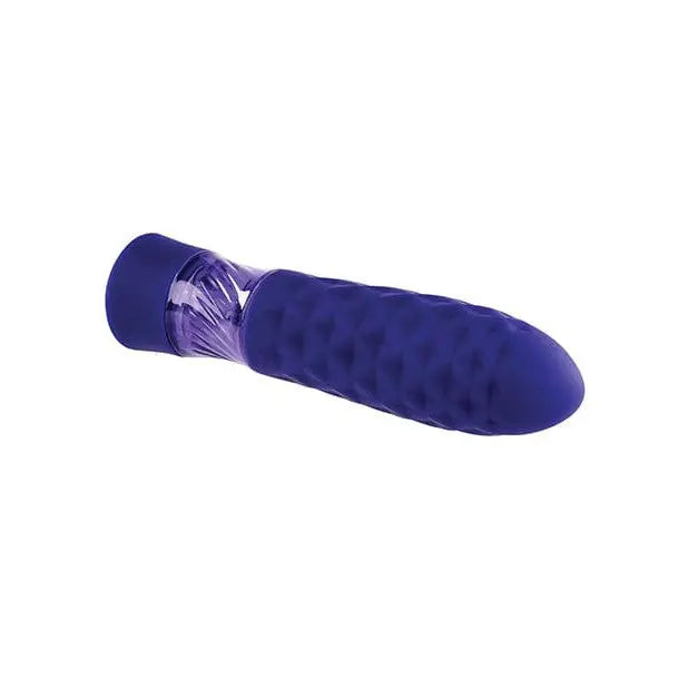 Purple silicone personal massager Evolved Raver Light Up Bullet textured surface