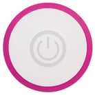 A pink and white alarm clock displayed with the Evolved Rechargeable Mini G-Spot Vibe