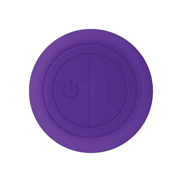 Purple circular device from Evolved Sweet Spot with a power symbol on its surface