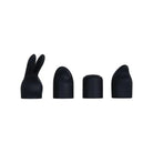 Evolved Tiny Treasures - Three black plastic rabbit heads on a white background