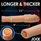 Extra Thick 2 Inch Penis Extension - flesh-colored cylindrical object with measurements