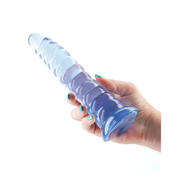 Hand holding product: Fantasia Nymph Jelly Dildo Teal inches with blue plastic water bottle