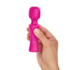 Hand holding Femme Funn Ultra Wand Mini, a pink toy from the Funn Ultra collection