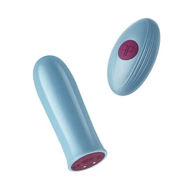 Close-up of Femme Funn Versa Bullet: blue and pink device with a red button