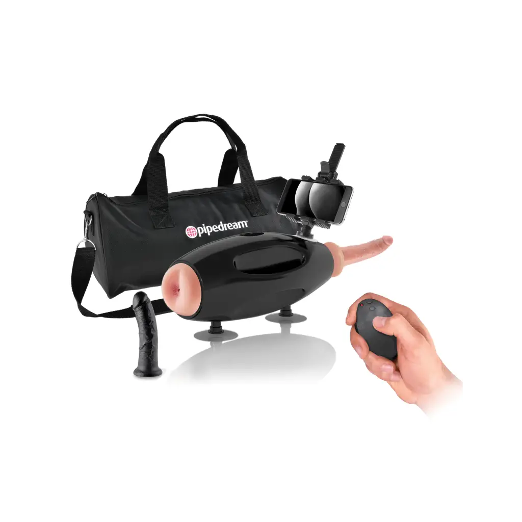 Hand holding the baby seat of Fetish Fantasy International Extreme Thrusting sex machine