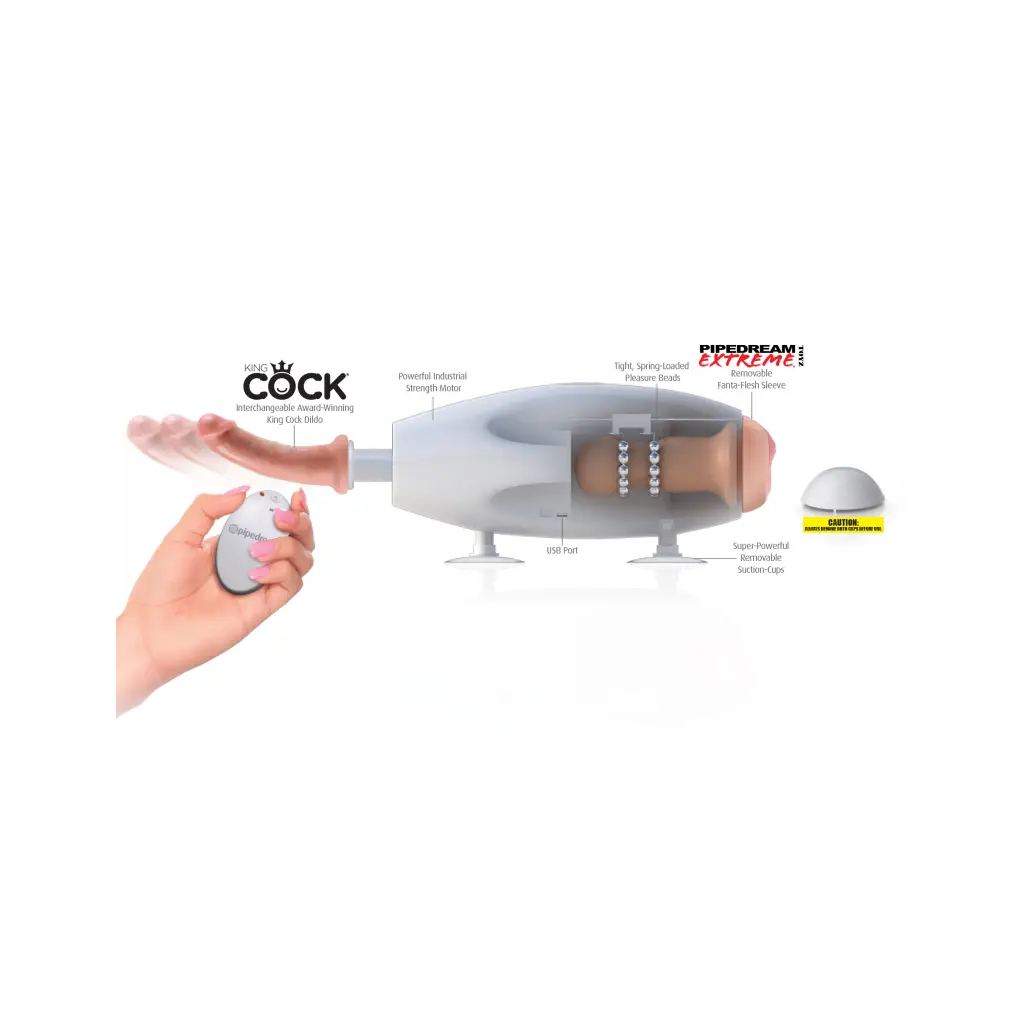 Hand holding remote control for the Fetish Fantasy Couples Sex Machine