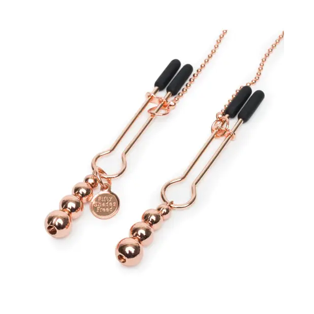 Fifty Shades Freed rose gold nipple clamps with beads and silicone tips for sensual pleasure