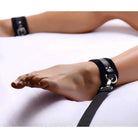 Woman’s hand with wrist strap from Frisky 8 Piece Restraint Set for secure restraint play