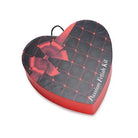 Heart-shaped box with red-black geometric design labeled ’Passion Fetish Kit’ - Frisky Passion Fetish Kit