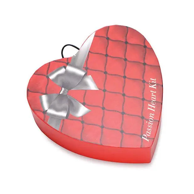 Heart-shaped red gift box with silver bow labeled ’Passion Heart Kit’ from Frisky Passion Heart