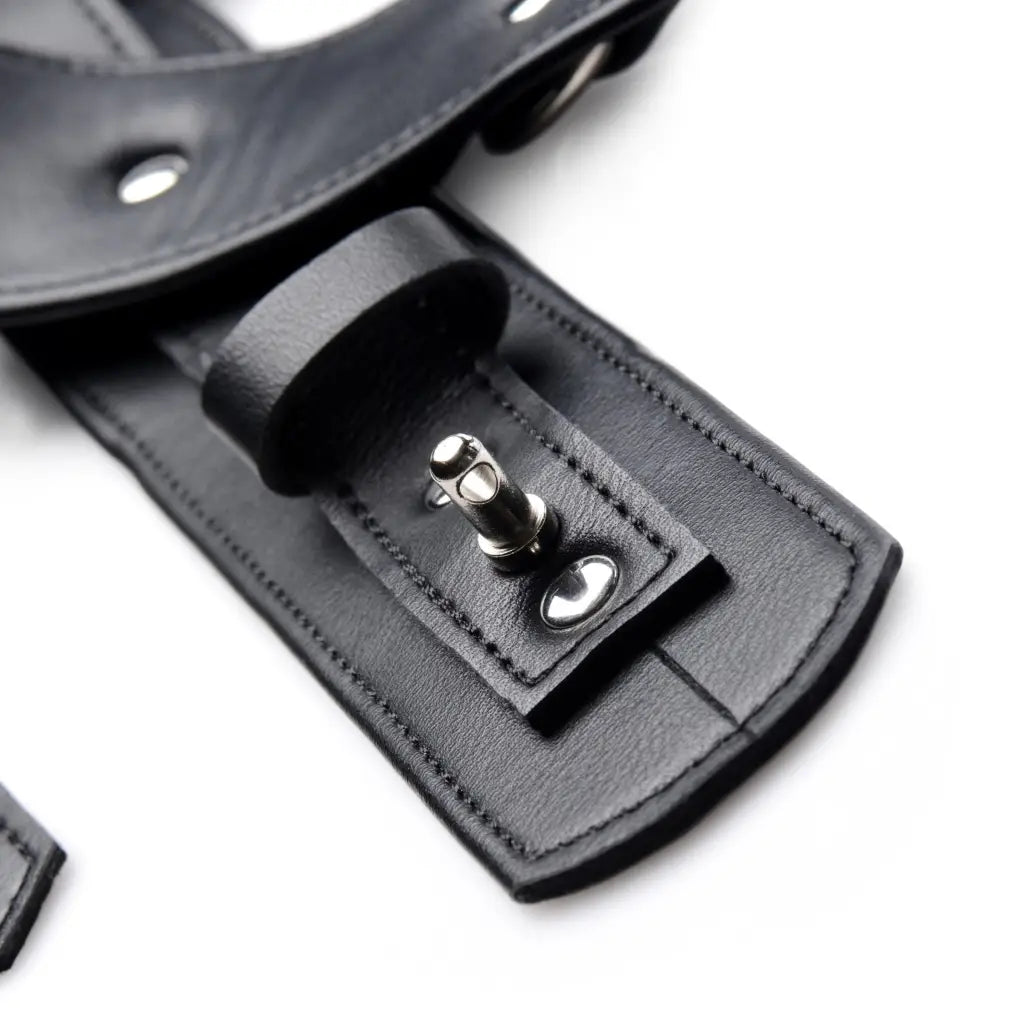 Close-up of Frog-tie Restraint Set’s leather zipper with a metal clasp