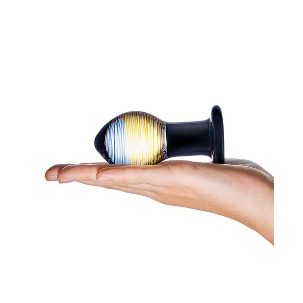 Hand holding illuminated Glas 3.5 in. Galileo Glass Butt Plug