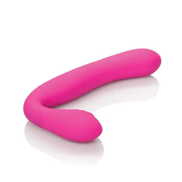 Curved pink silicone love rider strapless strap by CalExotics with rounded ends