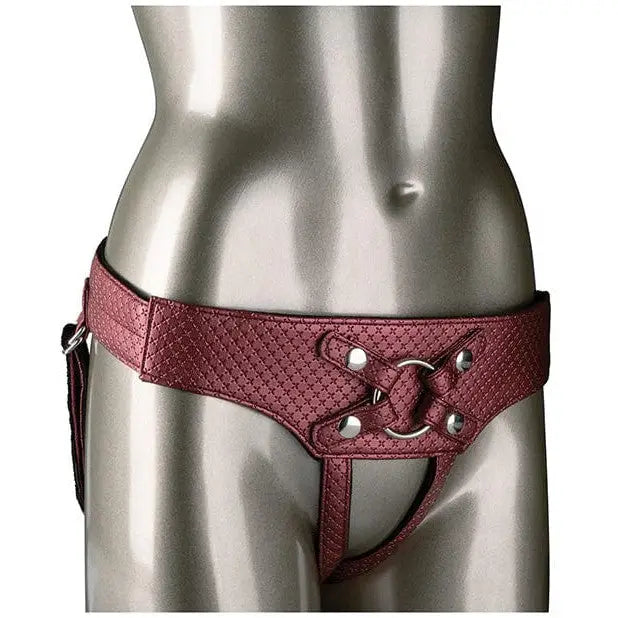 Female mannequin wearing Her Royal Harness Regal Empress Strap On Harness with pink leather belt