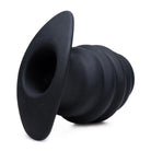 A pair of black silicon ear plugs for Hive Ass Tunnel Silicone Ribbed Hollow Anal Plug