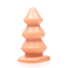 Ignite Bump Plug X Large: Small orange plastic pyramid with white background