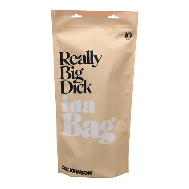 Tan resealable pouch displaying ’In A Bag 10’ Really Big Dick - Clear’ in bold, large text