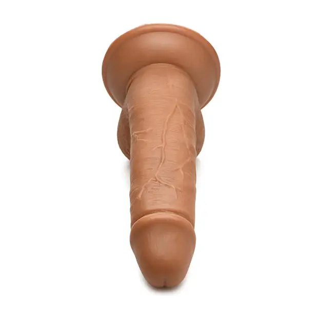 Clay sculpture of a man’s head beside Jock Soccer Sam 7 in. Dildo with Balls Dark product