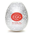 Keith Haring Tenga Egg with abstract patterns and TENGA branding on an egg-shaped object