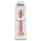 King Cock 13’ Dildo: Flesh-colored phallic sex toy in retail packaging labeled ’King Cock’