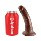 King Cock 6’ dildo with suction cup base alongside a red soda can for size comparison