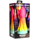 Rainbow-colored silicone sex toy shaped like a squid tentacle with a suction cup base